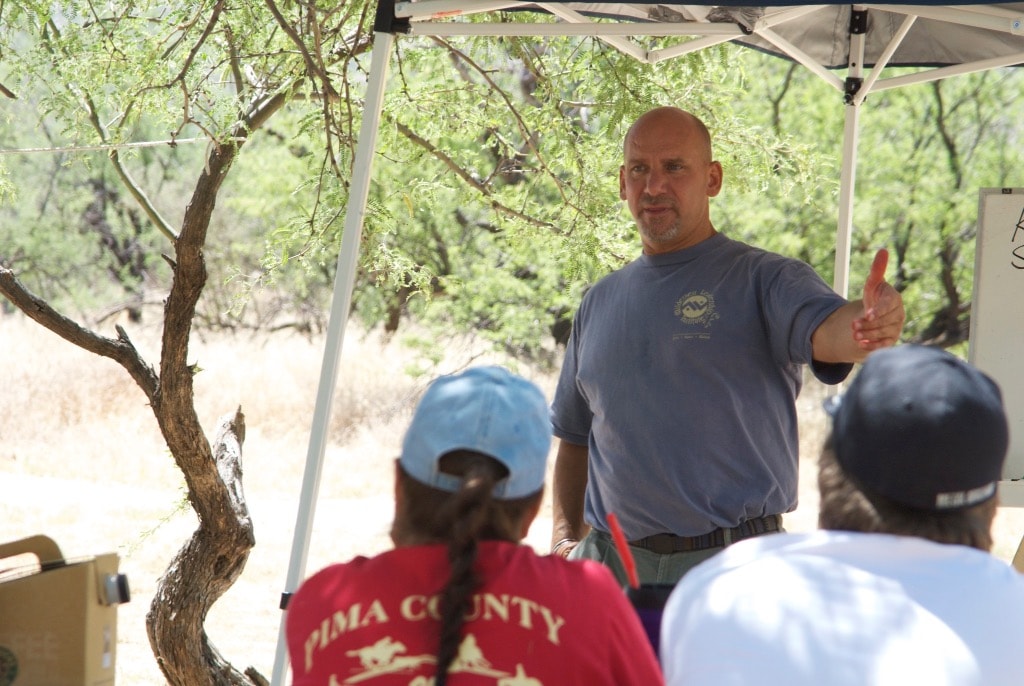 Dr. Kirk instructing a wilderness first aid class outdoors
